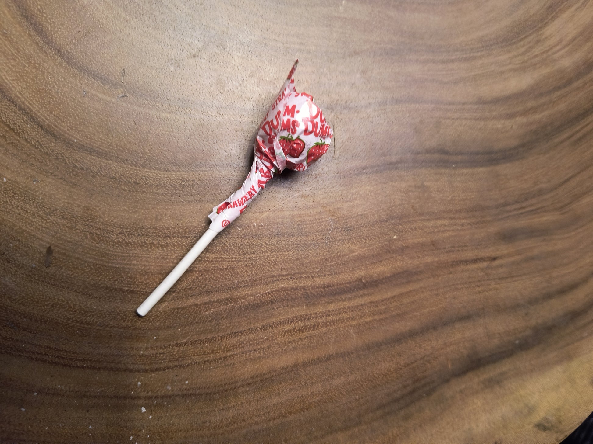 Licked and Rewrapped Lollipop